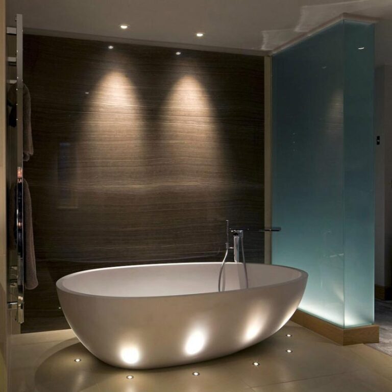 creative use of small lights in the floor make this soaking tub look like a spaceship. This is a great bathroom makeover idea for your Seattle remodel